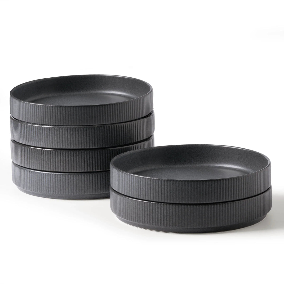 Black shallow ceramic bowls with ribbed outer walls