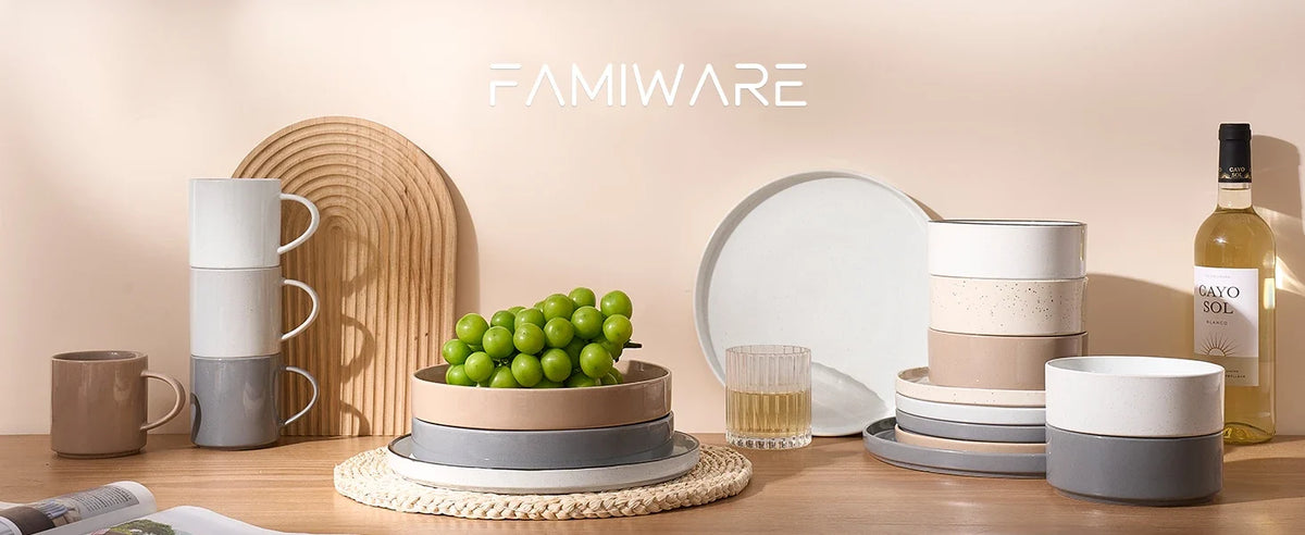 Ceramic plates, bowls, and mugs displayed on a table