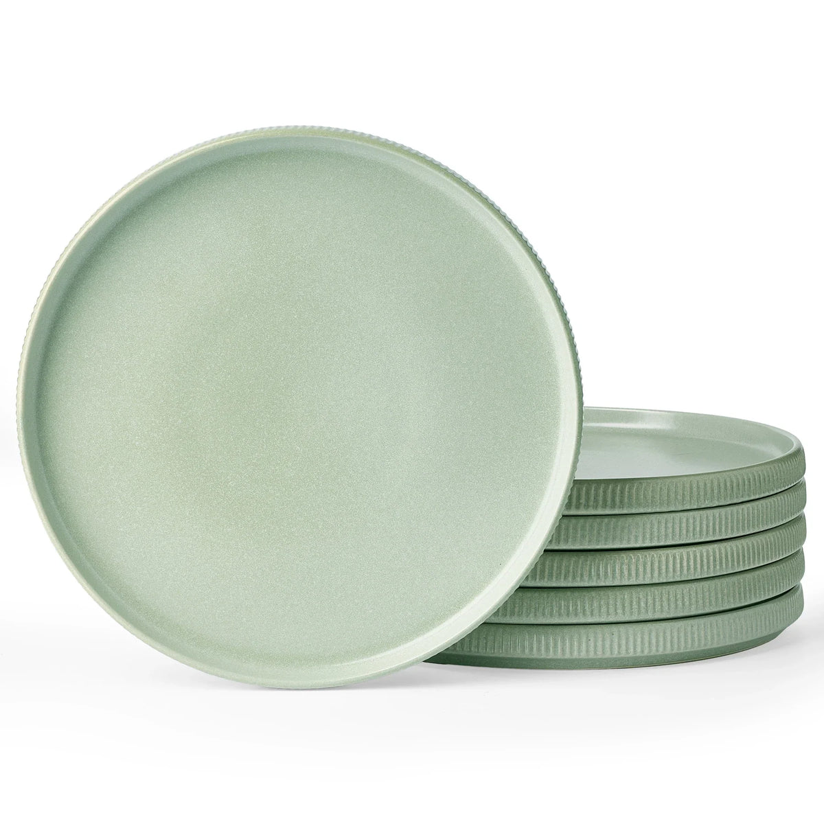 Pale green ceramic plates shown face-on and stacked