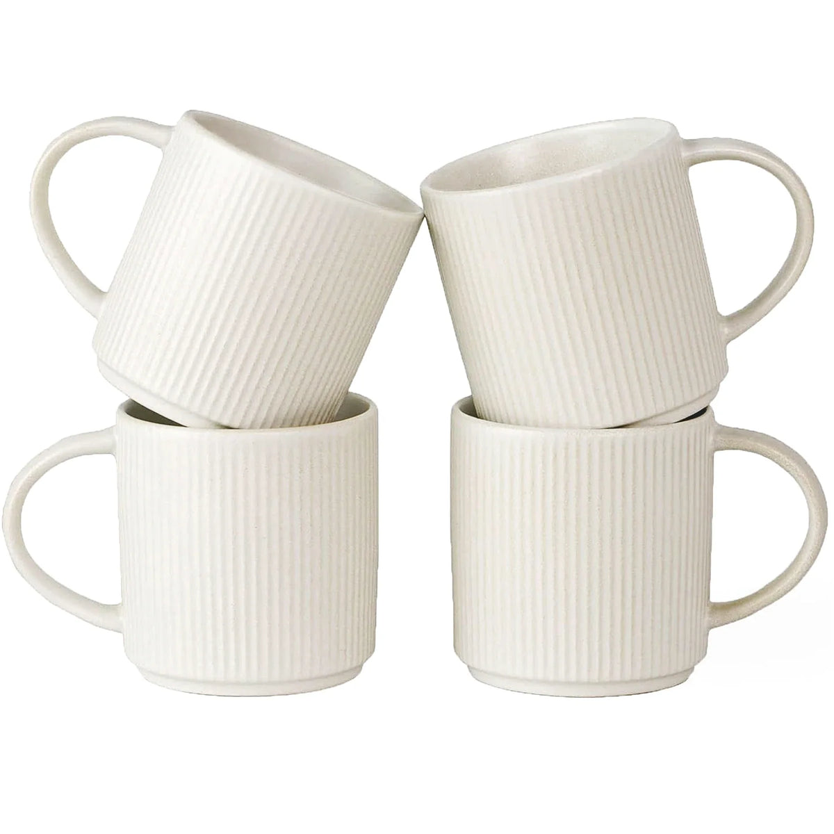 Four white ribbed ceramic mugs with handles arranged in two pairs