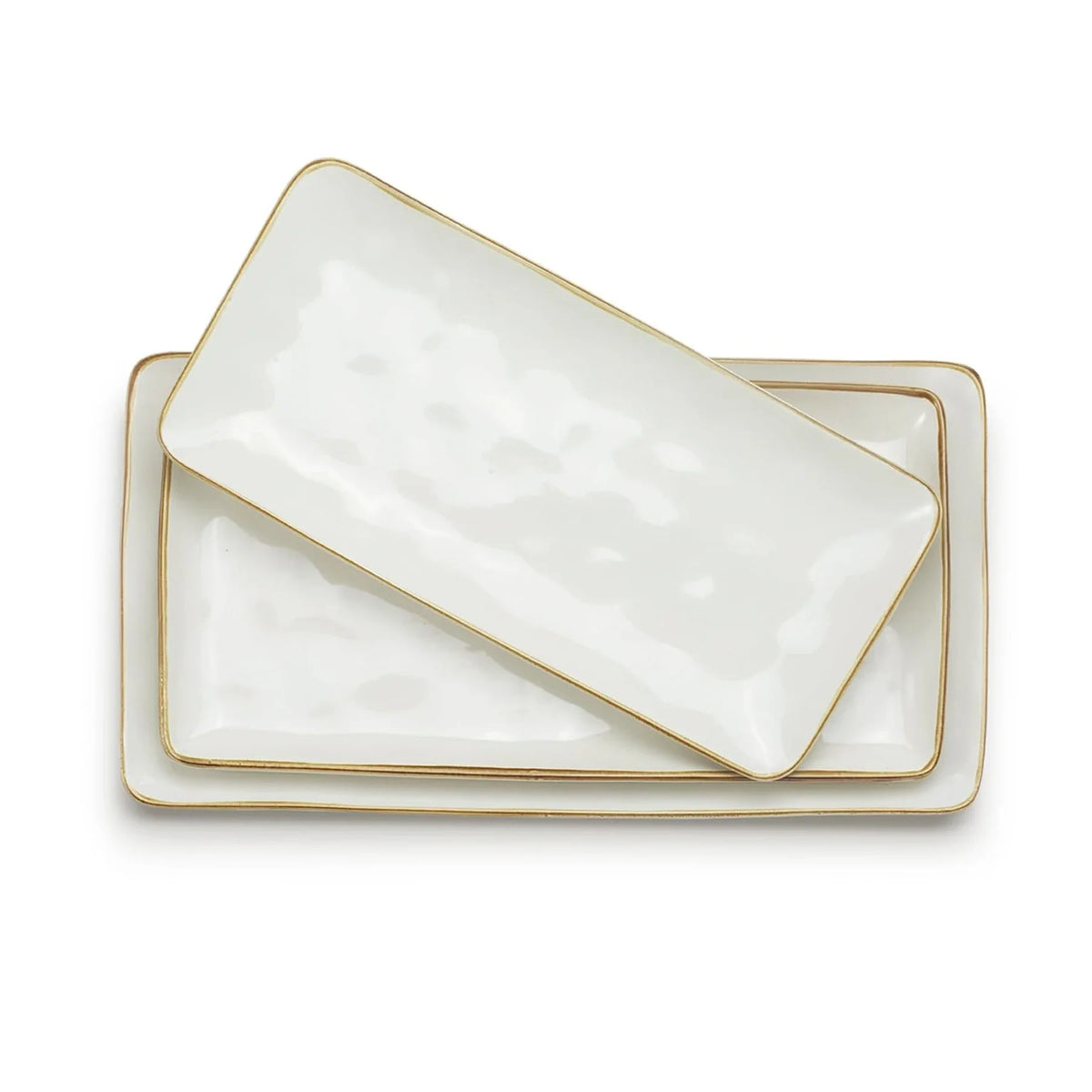 Three white rectangular ceramic serving platters in different sizes