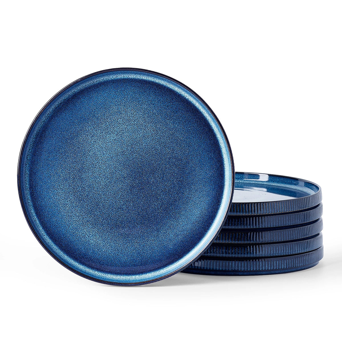 Blue ceramic plates with ribbed edges on a white background
