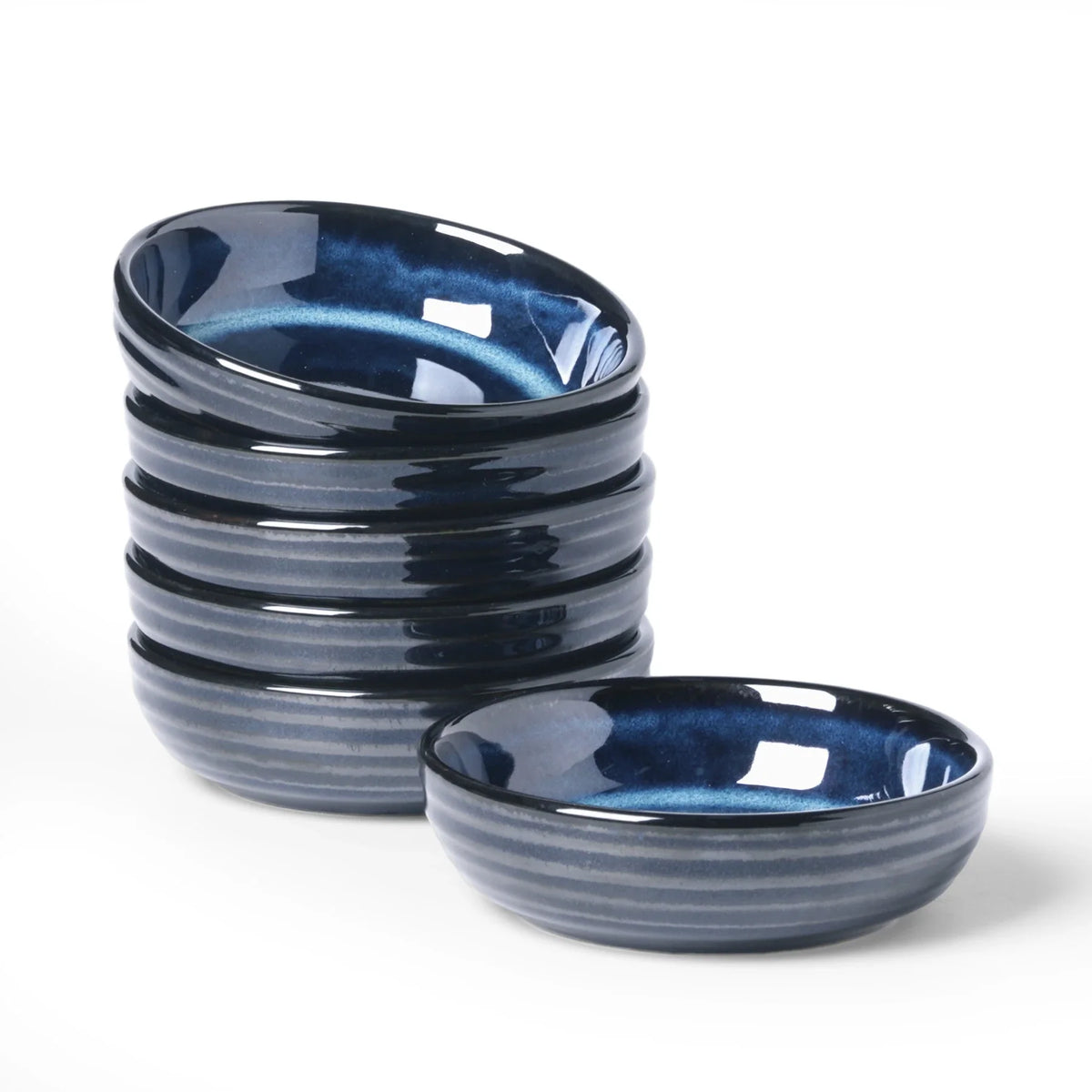 Small blue ceramic dishes with shallow curved sides