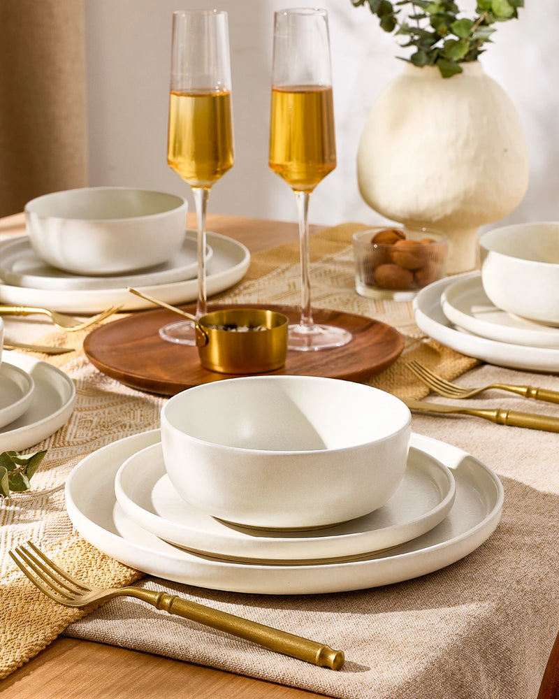 Famiware white stoneware dinnerware on a warm dining table
