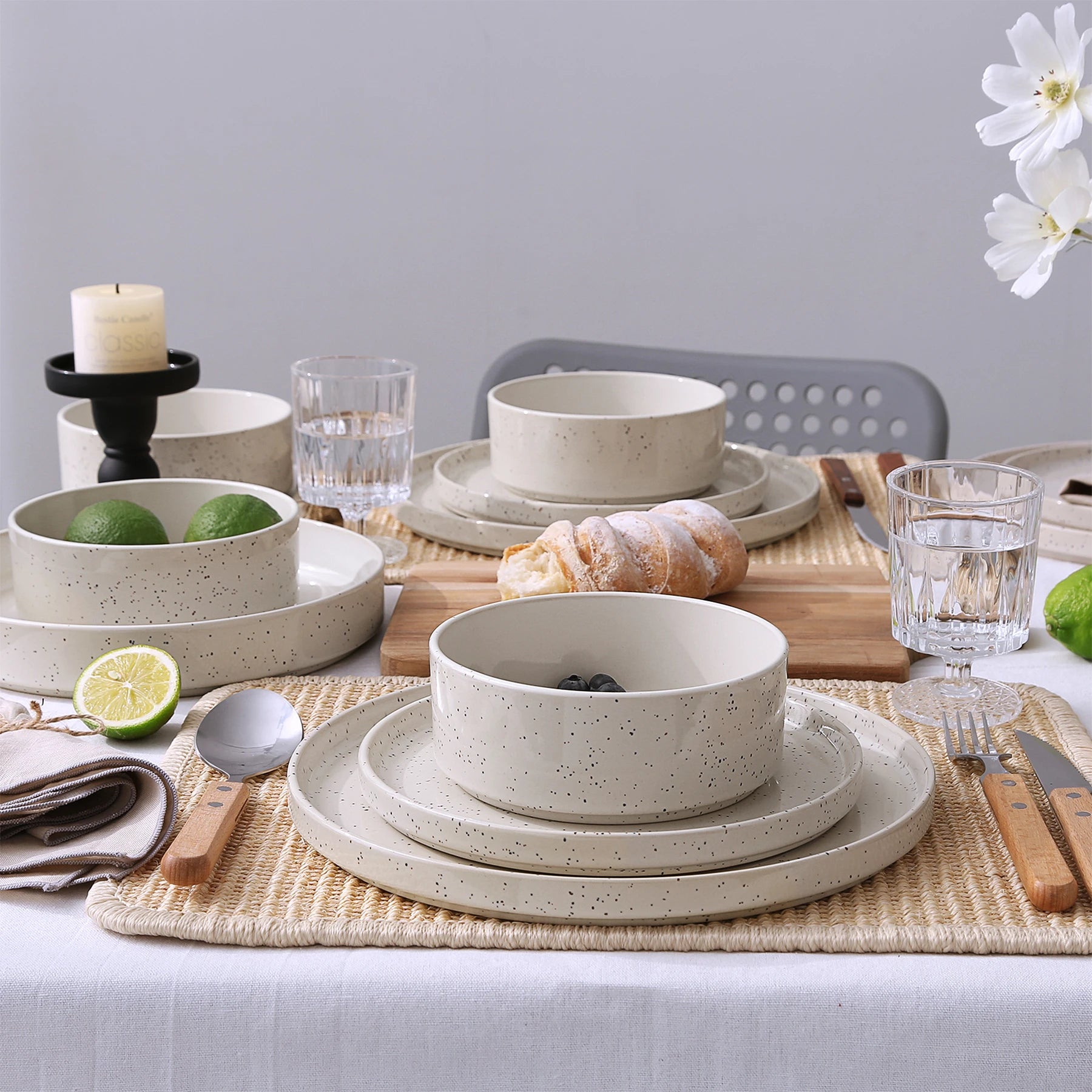 Cream-colored Famiware dinnerware on a dining table